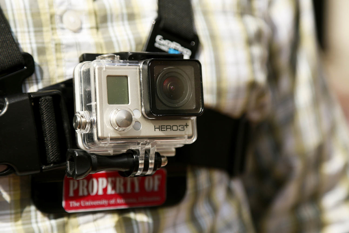 Student wearing GoPro camera using the chest harness
