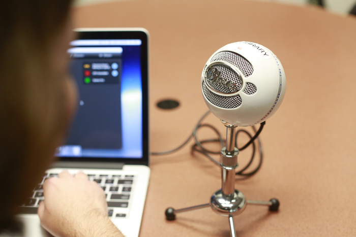 Photo of an external microphone hooked to a laptop